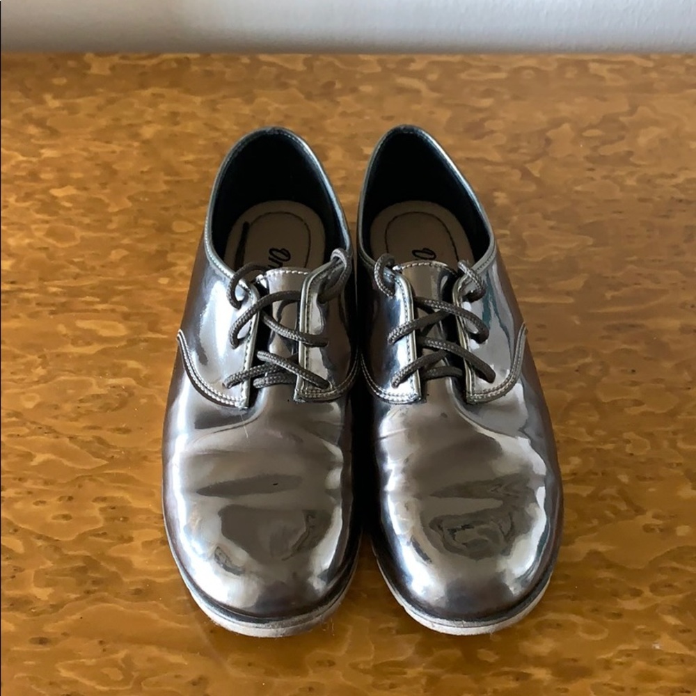 Severely worn low top shoes